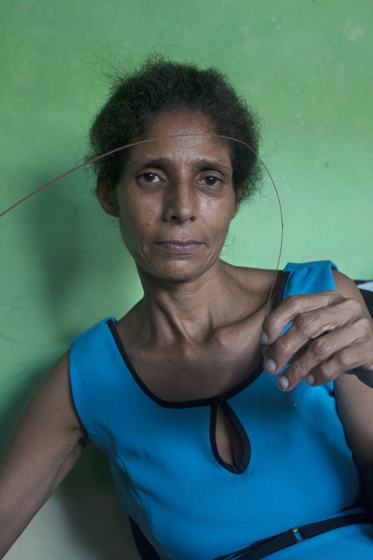 Violet, originally from Caucasia, Antioquia, lives in Villa Estrella. She arrived in Cartagena in 2005 with her son and daughter - no partner. Her pueblo was divided between two armed groups. She, too, left behind a farm that provided her family with everything they needed. She registered as an official victim of displacement when she arrived but still has not received housing nor humanitarian aid.