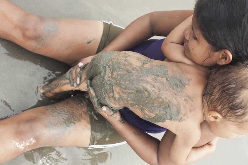 Dayli and her son Sebastian at the beach. Dayli arrived in Cartagena with her mother, Gavelys. It was another year before she was reunited with her father, who had also been unjustly incarcerated, and her three brothers. They now live together in Membrillar.&amp;nbsp;