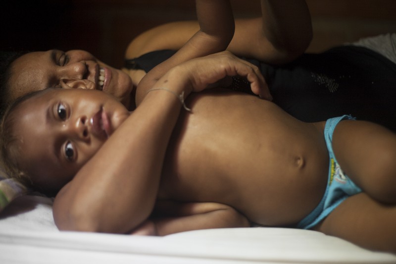 Gavelys and her grandson Neymar trying to nap after lunch. Gavelys weaves the traditional bags (&quot;mochilas&quot;) of her indigenous community, the Kankuamos. She sells them on the streets of downtown Cartagena but has a harder time making sales because she doesn&#039;t have a store front and she uses natural fibers, which tourists often overlook in favor of brightly colored, knock-off bags. Gavelys is one of 23 siblings.&amp;nbsp;