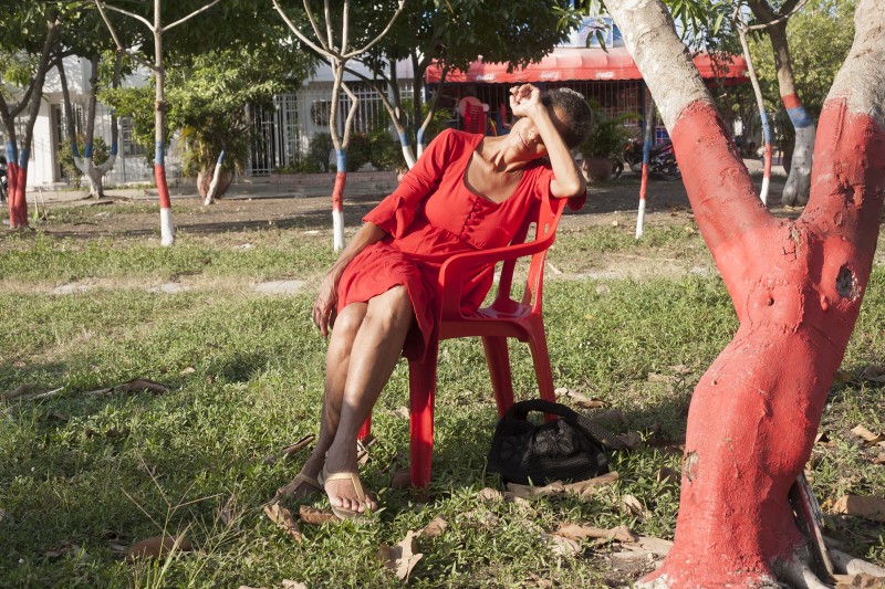 Violet in red in Villa Estrella. Although she participated in the play at FUNSAREP and attended various lectures and workshops on gender and victims rights, she always traveled alone; she had no real network of close women friends for counsel. She hadn&#039;t seen her daughter for nearly two years and couldn&#039;t afford the plane ticket to visit her in Cali, where she now lives with her young child. Violet&#039;s daughter was sexually violated in Villa Estrella a few years ago and left as soon as she could. &amp;nbsp;